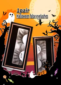 Dramatic thick Halloween false eyelashes in festive themed packaging with witch graphics