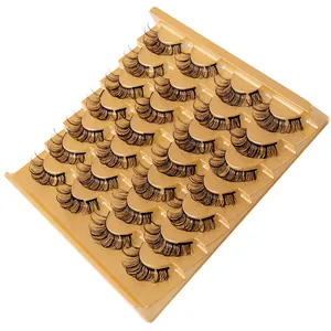 20 pairs of natural curly D-curl segmented false eyelashes on a champagne gold tray