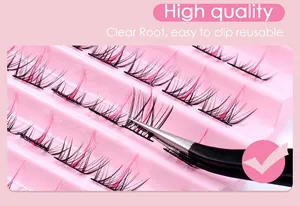 Macro detail of high quality mixed pink and black lash clusters with clear roots on tray