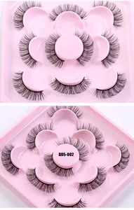 Macro shot of 5 pairs of Russian curl DD false eyelashes in a pink tray, model DD5-002
