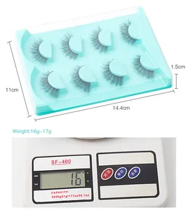 Détail des faux cils dimensions 14,4x11x1,5cm pesant 16g dans un plateau bleu clair