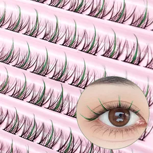 Natural black and green cluster eyelashes in a pink tray with a realistic eye wear effect