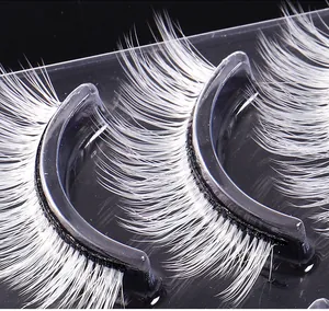 Macro shot of 5 pairs of white synthetic false eyelashes for cosplay and stage makeup