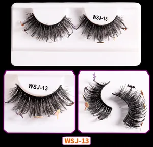 Detail of WSJ-13 Halloween lashes with purple bat and yellow lollipop sequins on black tray