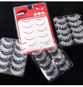 Detail view of 5 pairs white fiber false eyelashes with dramatic feathered style and red card
