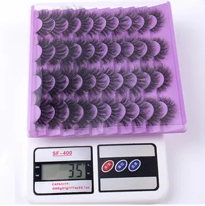 Detailed scale view showing the 35g weight of a 20-pair fluffy false eyelashes set