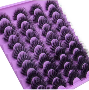 Detailed macro view of 20 pairs of dense curly black false eyelashes on a purple tray