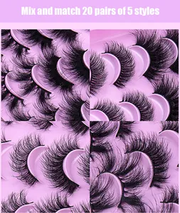 Detailed view of 20 pairs of dense faux mink eyelashes in 5 varied styles on pink trays