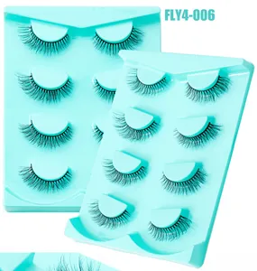 Détail de 4 paires de faux cils en vison synthétique avec courbure naturelle sur plateau