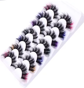 Macro view of 7 pairs 3D false eyelashes with colorful tapered ends in white tray