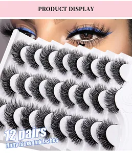 Detailed view of 12 pairs of fluffy faux mink lashes with natural thick curl on a tray