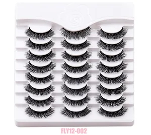 Detailed view of 12 pairs fluffy messy lashes set with voluminous curl on white tray