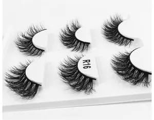 Detail view of R16 6D fluffy faux mink eyelashes set with three pairs in a white case