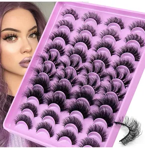 Detail of 20 pairs of dense faux mink eyelashes set in a pink tray on model