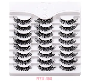 Macro detail of 21 pairs of dense black fluffy false eyelashes in a tray