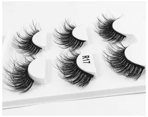 Macro shot of R17 fluffy 6D eyelashes with dense curled fibers in a 5-pair set tray