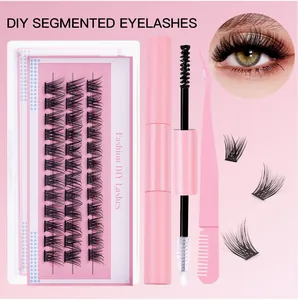 DIY segmented eyelash kit with black fibers, pink tweezers, and dual-end lash glue tool