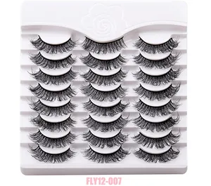 Macro shot of dense and curled synthetic eyelashes in a neat tray set of twelve pairs