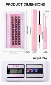 Detailed dimensions of individual lash clusters set with glue and tweezers on scale