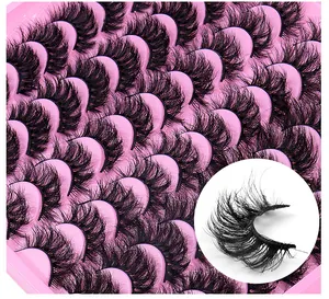 Detailed macro view of dense, curly faux mink eyelashes in 30-pair bulk tray packaging