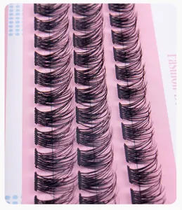 Detail of wispy manga style false eyelashes with natural curl on pink display card