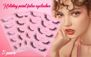 Detail view of 5 pairs of holiday false eyelashes with colorful flower petal accents