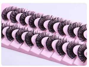 Close-up of dense curly DD russian volume false eyelashes on pink tray set