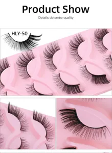 Detailansicht von 5 Paar natürlich dicken Fox-Eye-Wimpern auf rosa Tablett