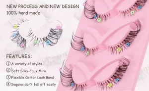 Detail of fox-style lashes with clear band and colorful flower sequins on pink tray