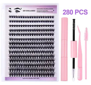 Detailed set of 280 clusters DIY eyelashes with pink application tools on white background