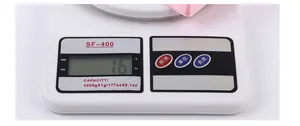 Close-up of SF-400 digital kitchen scale showing LCD screen and precision buttons