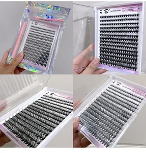 Detail of DIY cluster eyelashes kit featuring natural wispy lashes and pink brush tool