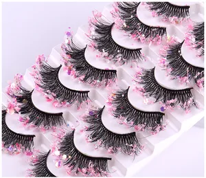 Detail von 10 Paar dichten Kunstmink-Wimpern mit bunten Glitzer und rosa Pailletten-Dekor