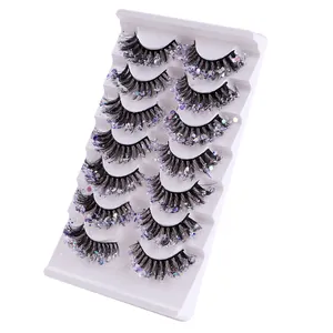 Set mit 7 Paaren leuchtenden holografischen Glitzer-Wimpern auf weißem Tray