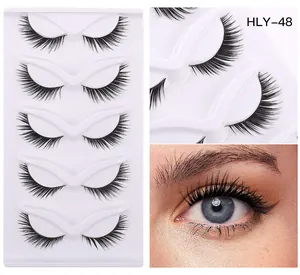 Close-up of 5 pairs of thick winged false eyelashes with natural volume and 3D curl