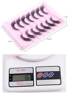 Detailed view of 7 pairs of fox-eye eyelashes with package dimensions and weight shown