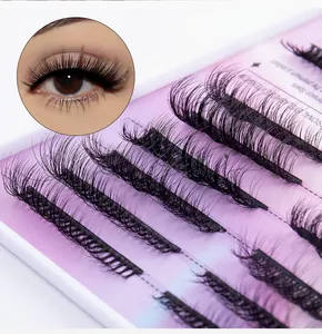 Macro detail of natural curled cluster eyelashes in professional extension set packaging