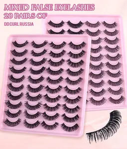 Close-up of 20 pairs of DD curl Russian style false eyelashes on pink trays
