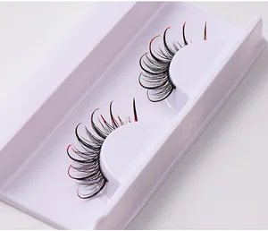 Detailed close-up of Russian D curl false eyelashes with glitter red gradient tips