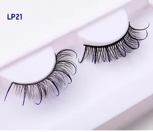 Macro shot of D-curl black and blue glitter false eyelashes in model LP21 white tray