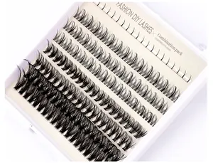 Macro shot of DIY lash clusters showing delicate black synthetic fibers and root details