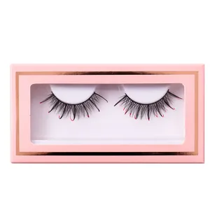 Dramatic red tipped lashes in a pink display box with rose gold trim and dense volume