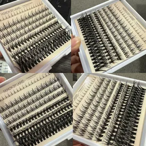 Detailed close-up of DIY cluster eyelashes with various lengths in a display box