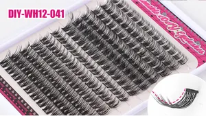 Macro shot of high-quality DIY cluster eyelashes with natural curl on a pink floral tray