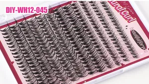 Macro shot of segmented DIY eyelashes with natural curl in a pink display box