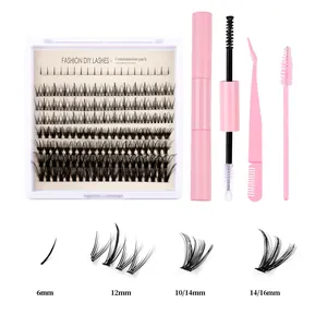 DIY cluster eyelash extension kit with pink tools and individual lash trays