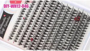 Macro view of individual black DIY segmented eyelash clusters in a white display box