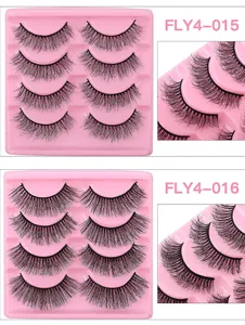 Detail view of 4 pairs of thick synthetic false eyelashes in pink plastic trays