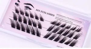 Macro detail of dense DIY eyelash clusters on pink star gradient card tray