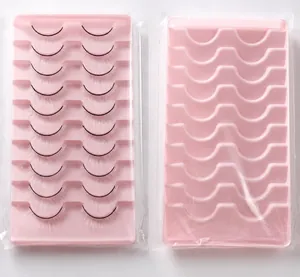 Pink trays for ten pairs of white false eyelashes showing storage and packaging detail
